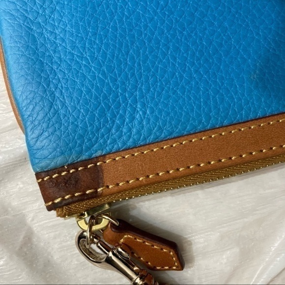Dooney and Bourke blue leather wristlet bag